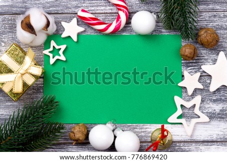 Christmas decoration green greeting card , cinnamon candy cane star.