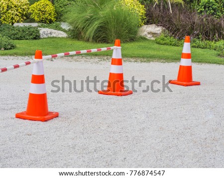 Temporary street cone at the temporary parking lot.