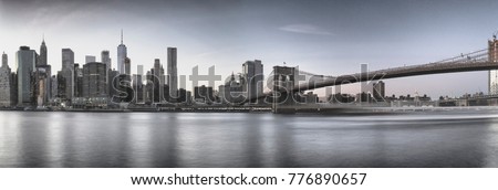 Manhattan skyline with Brooklyn Bridge - HDR image.
