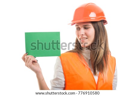 Attractive successful girl showing blank paper card with advertising area