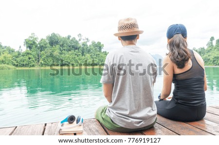 Men and women are sitting in a view while sitting lakeside holiday.