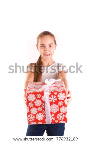 Happy girl with present box isolated on white