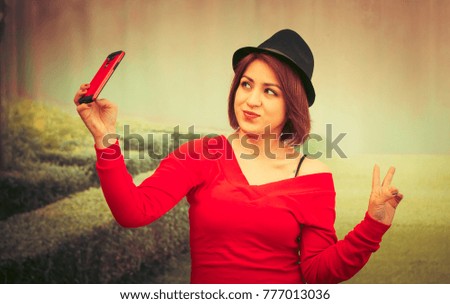 beautiful girl doing selfie