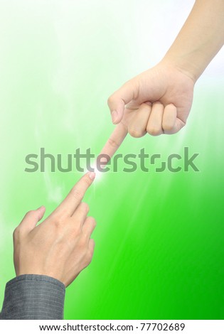 woman hand touch businessman hand on green background
