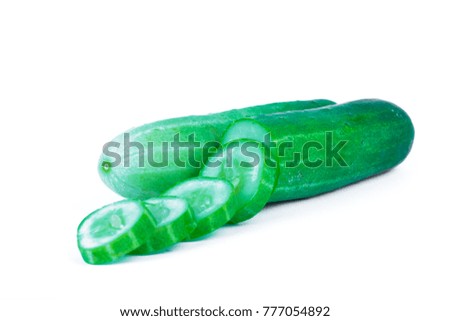 fresh cucumber is cut isolated on white background.