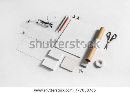 Blank stationery set on white paper background. Template for branding identity. For graphic designers portfolios. Top view.