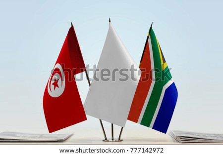 Flags of Tunisia and Republic of South Africa with a white flag in the middle