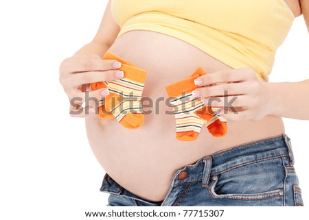 picture of beautiful pregnant woman belly and twin socks