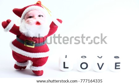 Santa claus with LOVE , cubic letter with white background use for Merry Christmas. 