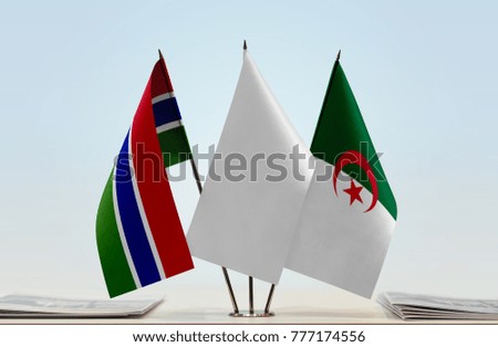 Flags of The Gambia and Algeria with a white flag in the middle
