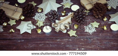 Christmas decoration on the wooden vintage background.  New year greeting card template. Vintage effect. Scandinavian style.