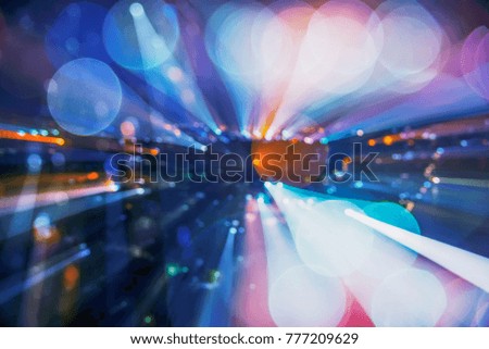Abstract background from blurred city night light with zoom. Holiday and party backdrop. Picture for add text message. Backdrop for design art work.