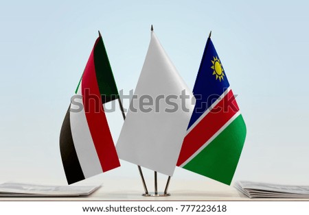 Flags of Sudan and Namibia with a white flag in the middle