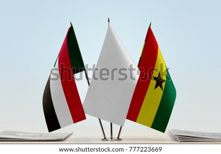 Flags of Sudan and Ghana with a white flag in the middle