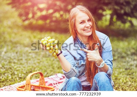 girl sitting in the sunny park. picnik