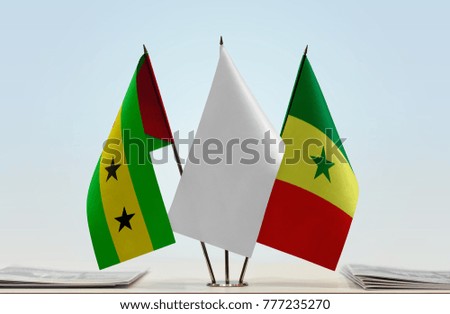 Flags of Sao Tome and Principe and Senegal with a white flag in the middle