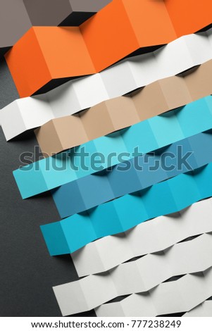 Geometric composition with colored elements of paper, abstract background