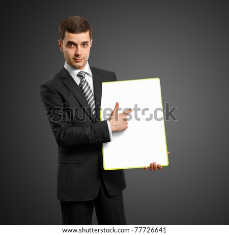 businessman holding empty write board in his hands