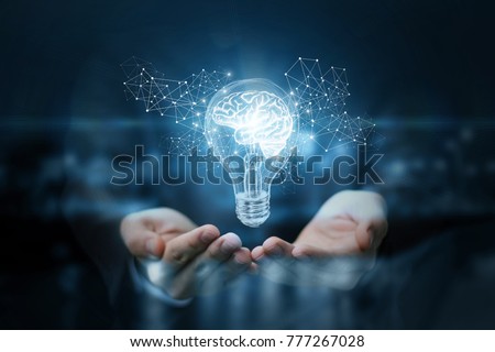 Light bulb with brain inside the hands of the businessman. The concept of the business idea. Royalty-Free Stock Photo #777267028