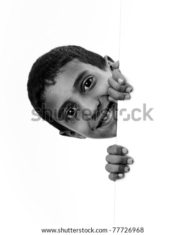 Cute african american (mixed race) boy with white banner for your text