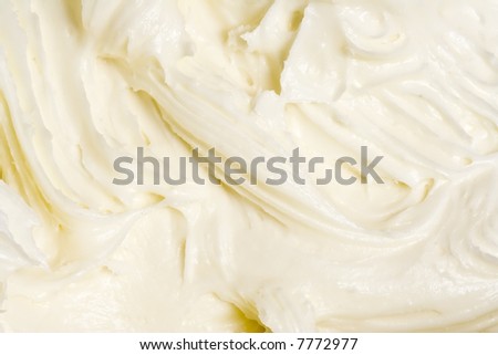 close up of cream cheese frosting mixed up in a glass bowl Royalty-Free Stock Photo #7772977