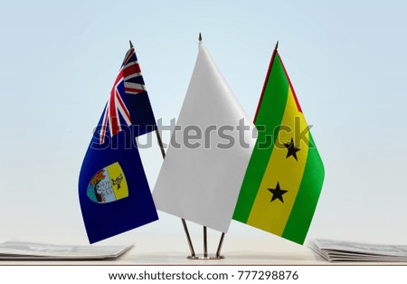 Flags of Saint Helena and Sao Tome and Principe with a white flag in the middle