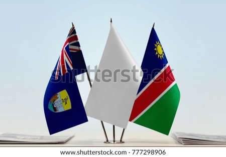 Flags of Saint Helena and Namibia with a white flag in the middle