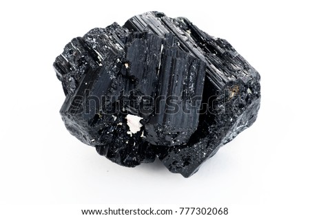 extreme close up of black tourmaline mineral isolated over white background in focus stacking technique Royalty-Free Stock Photo #777302068