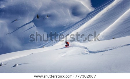 One freeride skier charging downhill through fresh and deep snow, Kuhtai Austria Royalty-Free Stock Photo #777302089