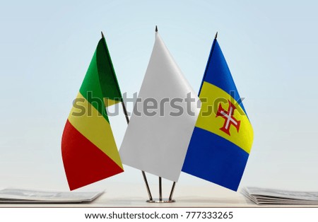 Flags of Republic of the Congo and Madeira with a white flag in the middle
