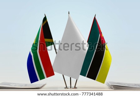 Flags of Republic of South Africa and Mozambique with a white flag in the middle
