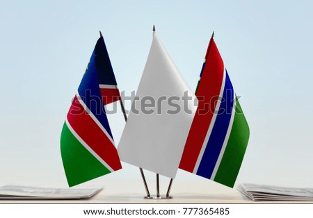 Flags of Namibia and The Gambia with a white flag in the middle