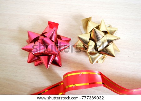 The ribbon flowers for christmas eve and happy new year party for the gift package birth day and anniversary  party