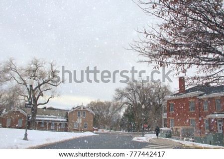 City: Pedestrian Point of View of the Dormitory Apartment Covered with Snow, Leafless Tree in Salt Lake City, Utah.