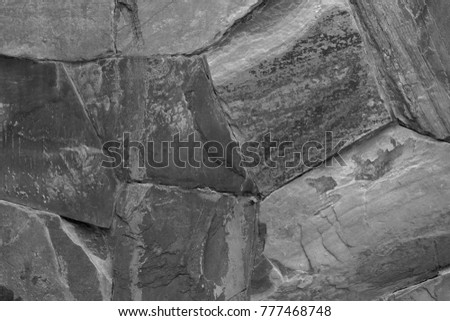 Dark grey black slate background or texture, stone wall.