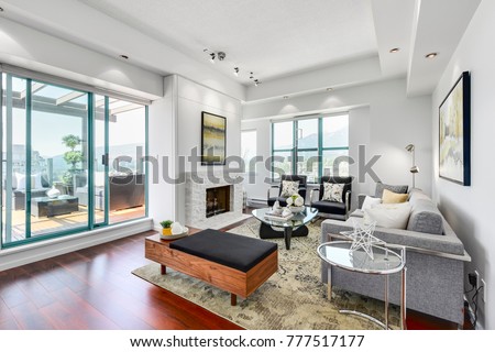 Living room interior in a luxury penthouse Royalty-Free Stock Photo #777517177