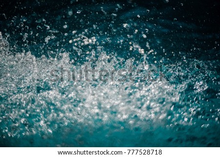 Beautiful blue water bokeh as an abstract background