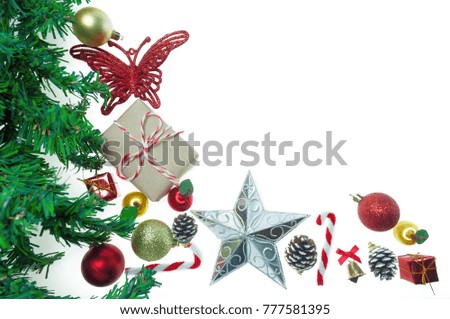 Christmas tree ornament for decorated , pine cones, gift boxes, red balls, bell, Red butterfly and apple  on white background.  Flat lay, top view and have copy space.