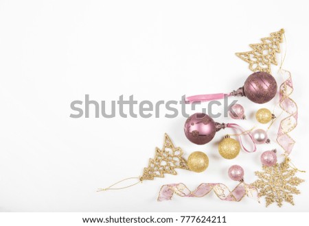 Christmas holiday composition. Festive creative golden pattern, xmas purple decor holiday ball with ribbon, gift, snowflakes, christmas tree on white background. Flat lay, top view