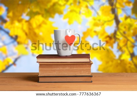 Cup of tea on stack book