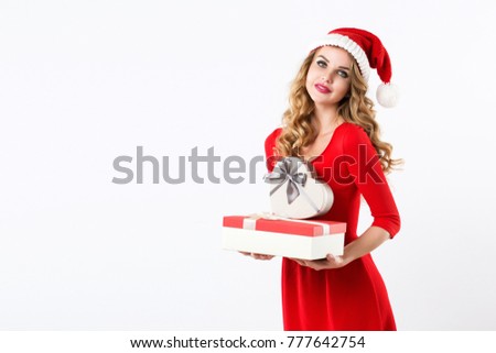 Beautiful Santa woman with gifts, New Year and Christmas. Isolated.