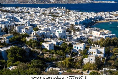 Mykonos island aerial panoramic view at sunny day. Mykonos is a island, part of the Cyclades in Greece with old architecture one the foreground