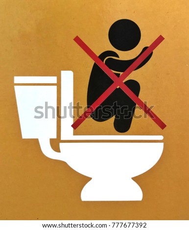 Do not step on the toilet.