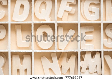 wood alphabet LOVE in the block