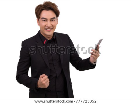Portrait of Businessman smiling and holding mobile phone; picture on white background with clipping path