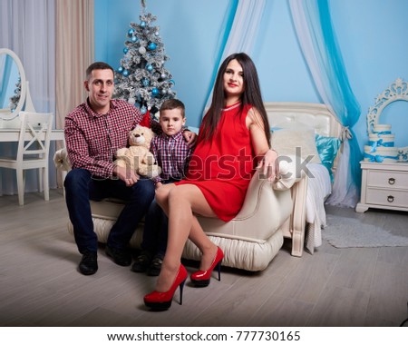 New year family portrait of couple and  their son