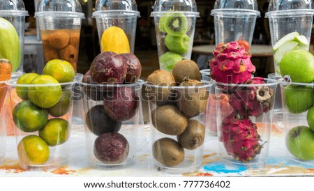 many fresh fruits in the glass for make to smoothie shake