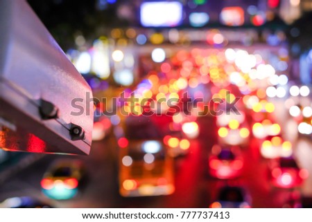 Abstract blur city night traffic jam bokeh background, transportation problems in Bangkok, Thailand