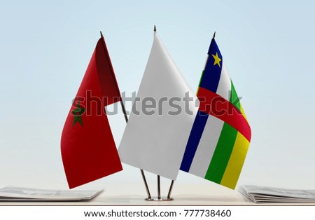 Flags of Morocco and Central African Republic with a white flag in the middle