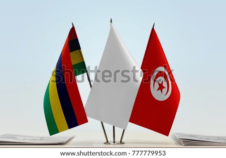 Flags of Mauritius and Tunisia with a white flag in the middle